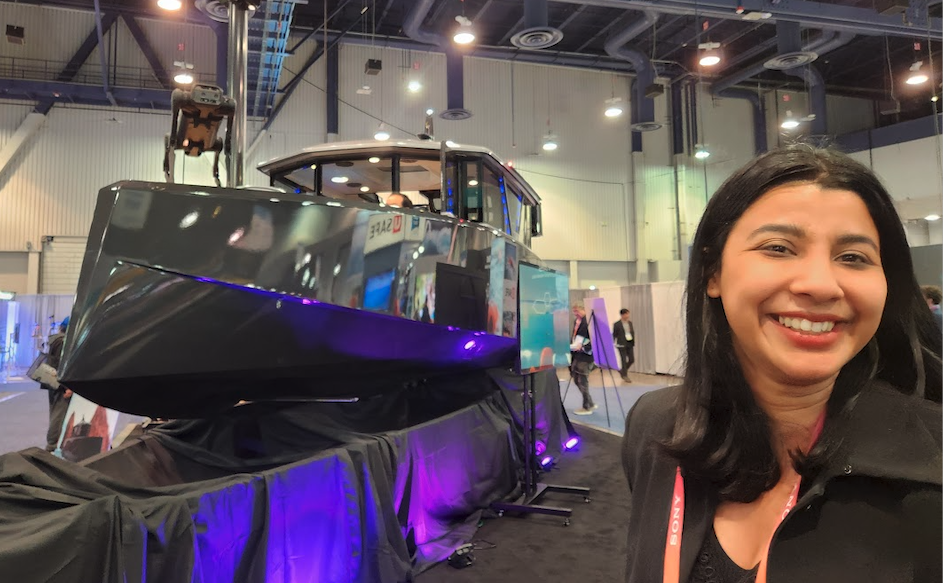 Navier’s ‘boat of the future’ with founder Sampriti Battacharya, plus an extra stowaway quadruped robot from Unitree. Image source: Andra Keay